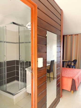 Imagen de la habitación del Hotel Karibea Camelia Residence. Foto 11