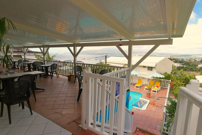 Imagen del bar/restaurante del Hotel Karibea Camelia Residence. Foto 2