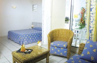 Imagen de la habitación del Hotel Karibean Baie Du Galion Resort-Goelette suites. Foto 3