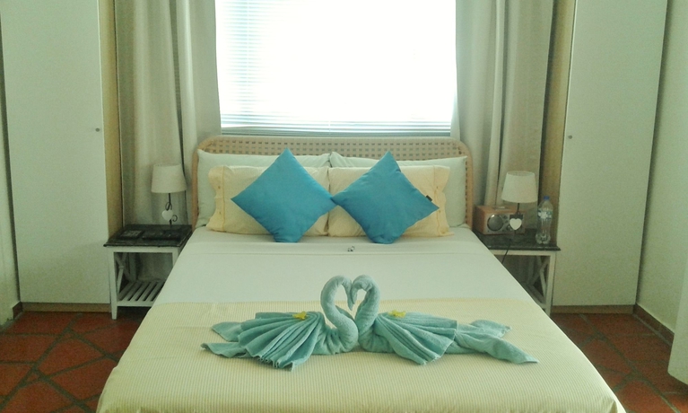 Imagen de la habitación del Hotel Karibu Aruba Boutique. Foto 8