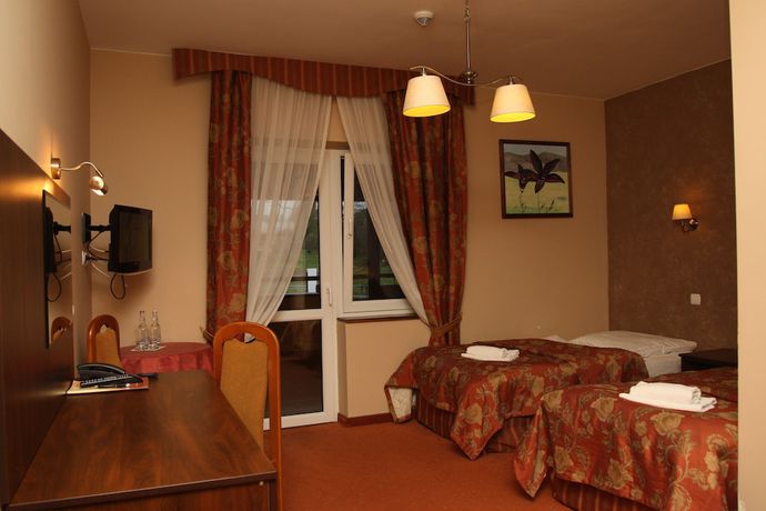 Imagen de la habitación del Hotel Karino Spa. Foto 9