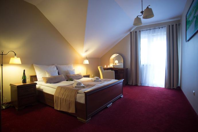 Imagen de la habitación del Hotel Karino Spa. Foto 11