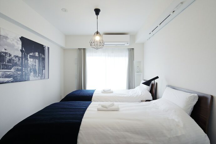 Imagen de la habitación del Hotel Kario Sasazuka Terrace. Foto 15