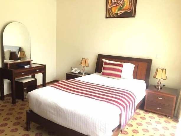Imagen de la habitación del Hotel Karisimbi. Foto 15