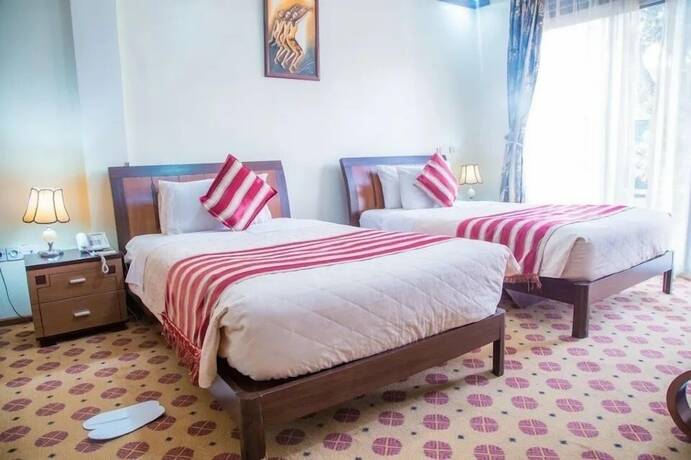 Imagen de la habitación del Hotel Karisimbi. Foto 16