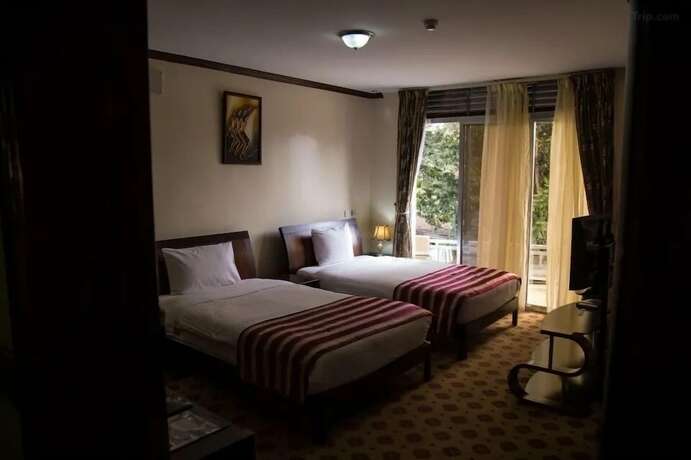 Imagen de la habitación del Hotel Karisimbi. Foto 18