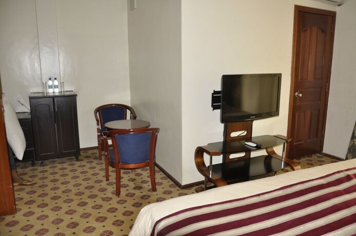 Imagen de la habitación del Hotel Karisimbi. Foto 20