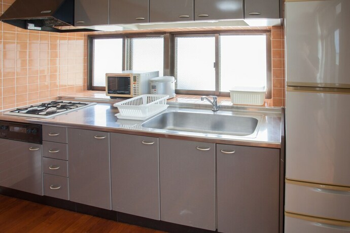 Imagen de la habitación del Hotel Kariyushi Condominium Resort Kin New Covenant. Foto 6