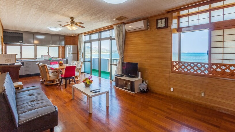 Imagen de la habitación del Hotel Kariyushi Condominium Resort Kin New Covenant. Foto 11