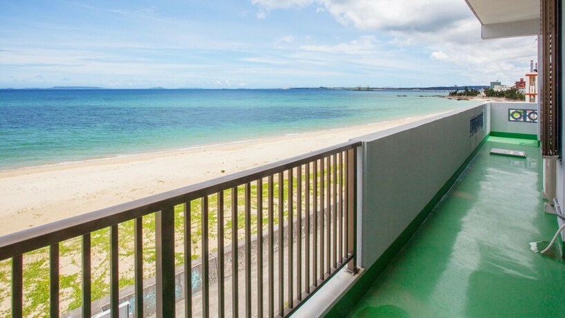 Imagen de la habitación del Hotel Kariyushi Condominium Resort Kin New Covenant. Foto 14