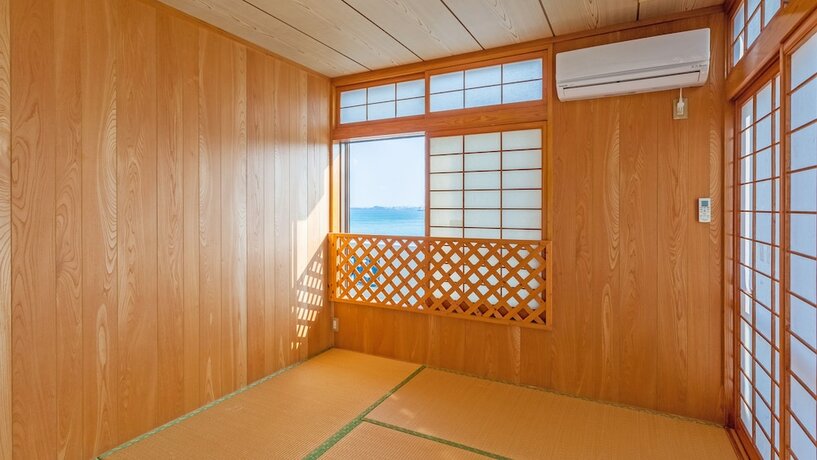 Imagen de la habitación del Hotel Kariyushi Condominium Resort Kin New Covenant. Foto 15