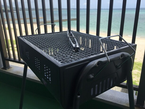 Imagen de los exteriores del Hotel Kariyushi Condominium Resort Kin New Covenant. Foto 16