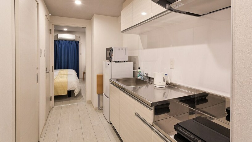 Imagen de la habitación del Hotel Kariyushi Condominium Resort Miyakojima Fukugistays. Foto 13