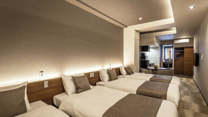Imagen de la habitación del Hotel Kariyushi Condominium Resort Naha GSA. Foto 14