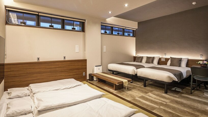 Imagen de la habitación del Hotel Kariyushi Condominium Resort Naha GSA. Foto 18
