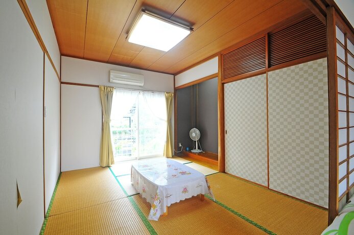 Imagen de la habitación del Hotel Kariyushi Condominium Resort Yuudekiya. Foto 2