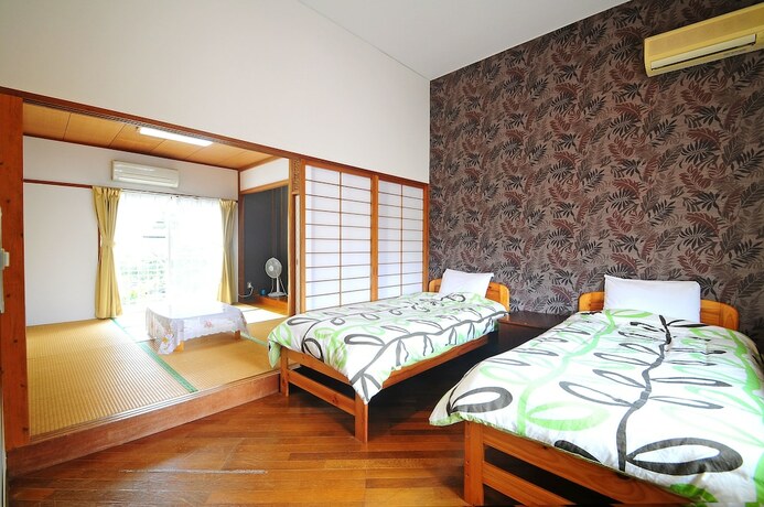 Imagen de la habitación del Hotel Kariyushi Condominium Resort Yuudekiya. Foto 3