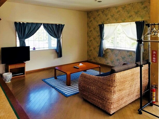 Imagen de la habitación del Hotel Kariyushi Condominium Resort Yuudekiya. Foto 7