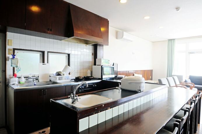 Imagen de los interiores del Hotel Kariyushi Condominium Resort Yuudekiya. Foto 18