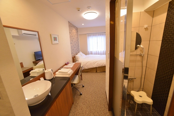 Imagen de la habitación del Hotel Kariyushi Lch. Izumizaki Kencho Mae. Foto 2
