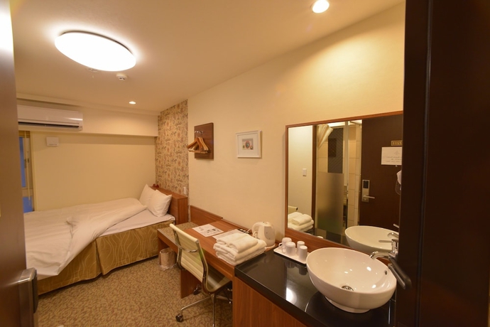 Imagen de la habitación del Hotel Kariyushi Lch. Izumizaki Kencho Mae. Foto 6