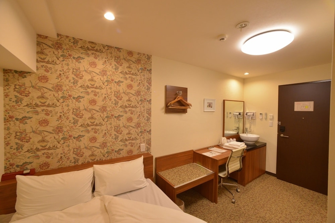 Imagen de la habitación del Hotel Kariyushi Lch. Izumizaki Kencho Mae. Foto 7