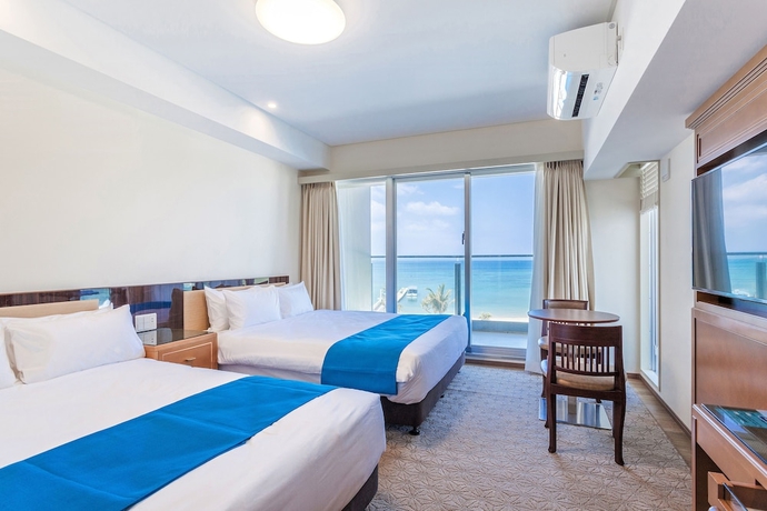 Imagen de la habitación del Hotel Kariyushi Lch Resort. Foto 2