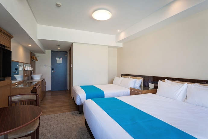 Imagen de la habitación del Hotel Kariyushi Lch Resort. Foto 3