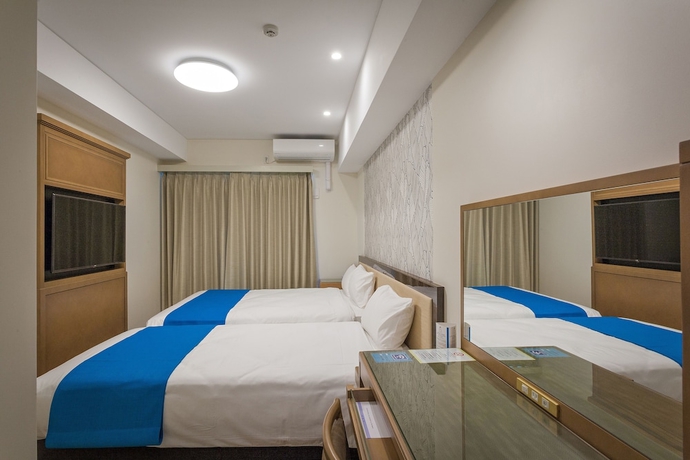 Imagen de la habitación del Hotel Kariyushi Lch Resort. Foto 6