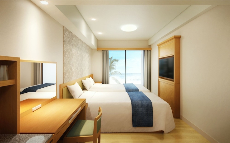 Imagen de la habitación del Hotel Kariyushi Lch Resort. Foto 7