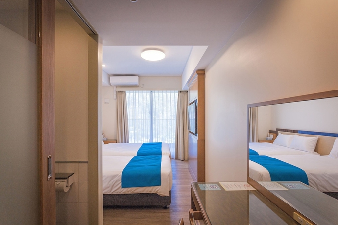 Imagen de la habitación del Hotel Kariyushi Lch Resort. Foto 9