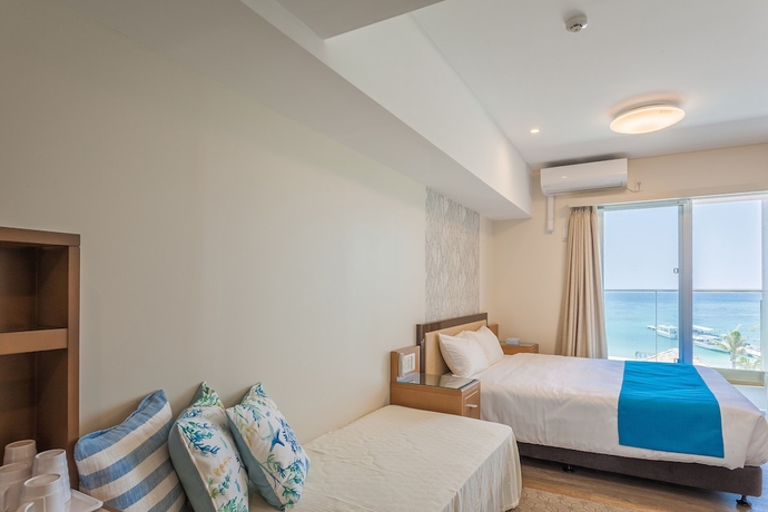 Imagen de la habitación del Hotel Kariyushi Lch Resort. Foto 10