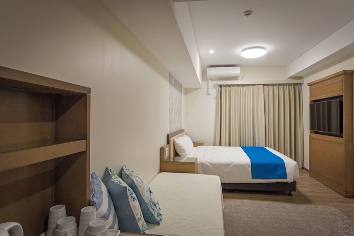 Imagen de la habitación del Hotel Kariyushi Lch Resort. Foto 11