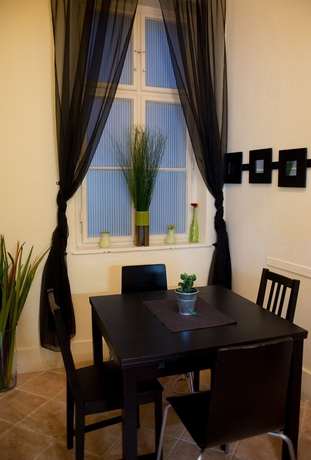 Imagen de la habitación del Hotel Karma Boutique Apartments. Foto 13