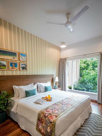 Imagen de la habitación del Hotel Karma Chalets, Gurgaon. Foto 11
