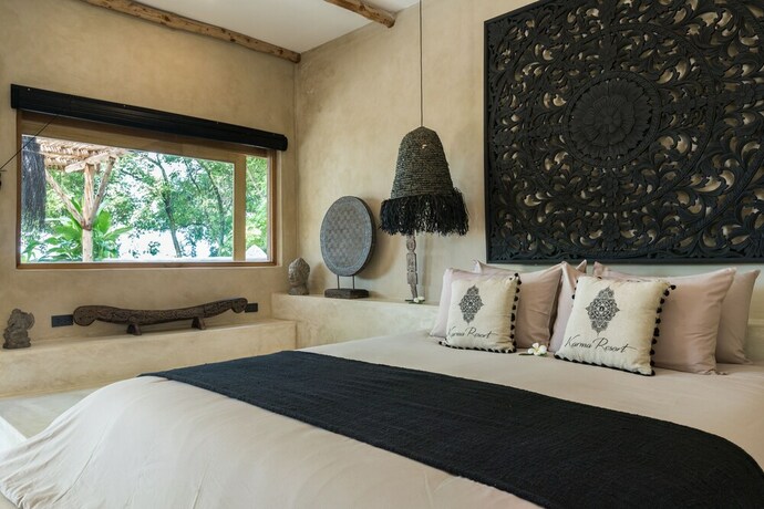 Imagen de la habitación del Hotel Karma Resort. Foto 14