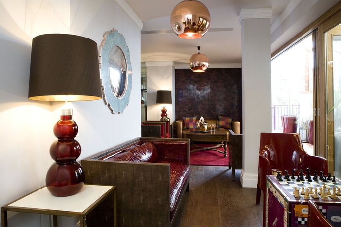 Imagen del bar/restaurante del Hotel Karma Sanctum Soho. Foto 2