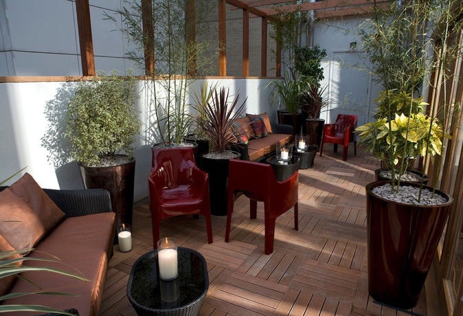 Imagen del bar/restaurante del Hotel Karma Sanctum Soho. Foto 3