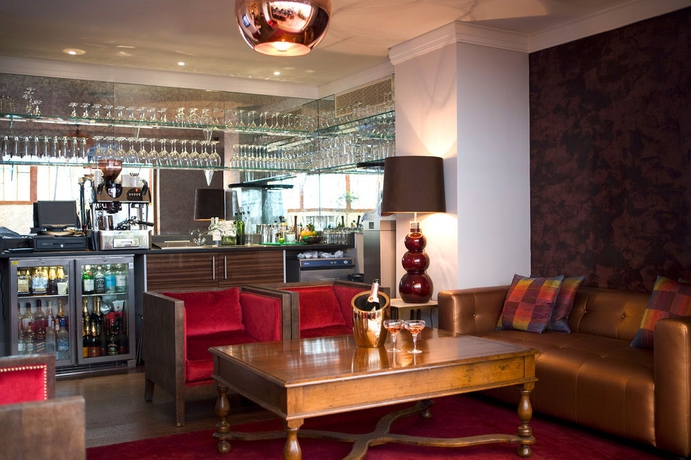 Imagen del bar/restaurante del Hotel Karma Sanctum Soho. Foto 4