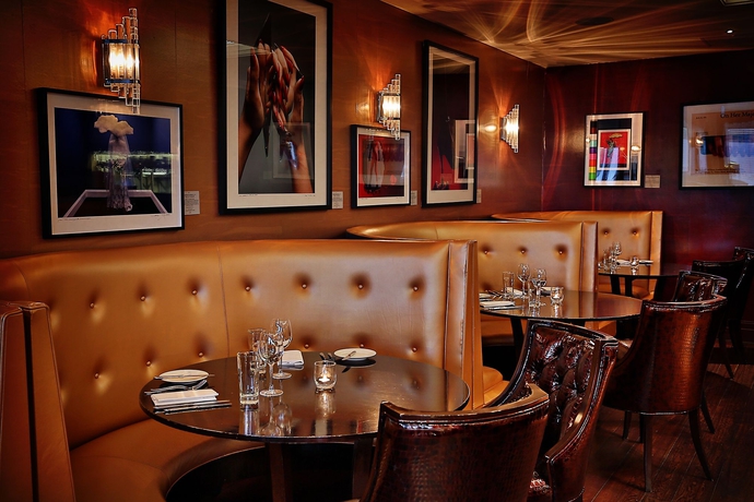 Imagen del bar/restaurante del Hotel Karma Sanctum Soho. Foto 6