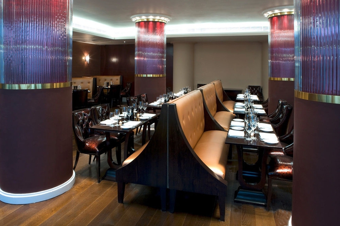 Imagen del bar/restaurante del Hotel Karma Sanctum Soho. Foto 7