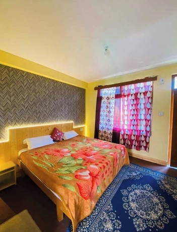 Imagen de la habitación del Hotel Karnataka House. Foto 10