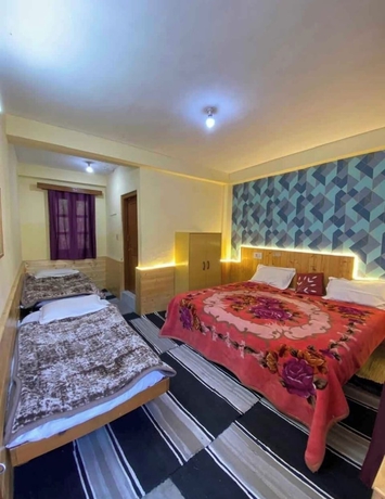 Imagen de la habitación del Hotel Karnataka House. Foto 11