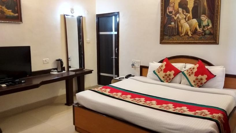 Imagen de la habitación del Hotel Karnavati. Foto 7