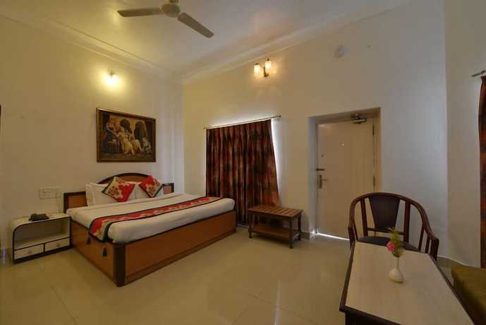 Imagen de la habitación del Hotel Karnavati. Foto 8