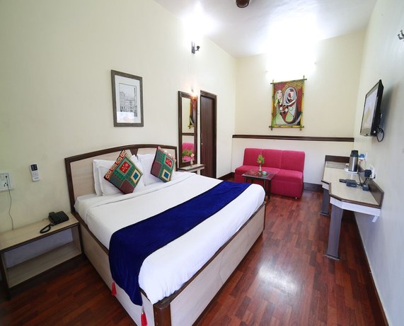 Imagen de la habitación del Hotel Karnavati. Foto 16