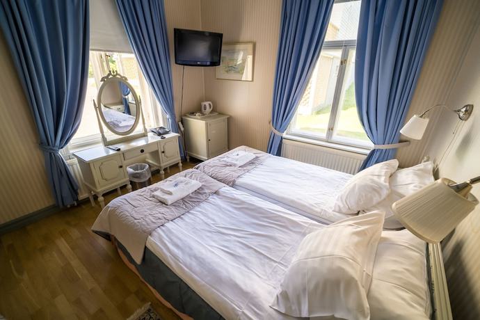 Imagen de la habitación del Hotel Karolineburg Manor House. Foto 15