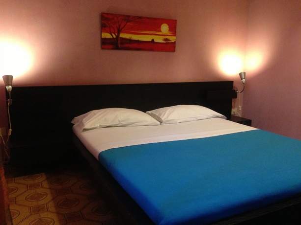 Imagen de la habitación del Hotel Karolstay Guesthouse Roma. Foto 6