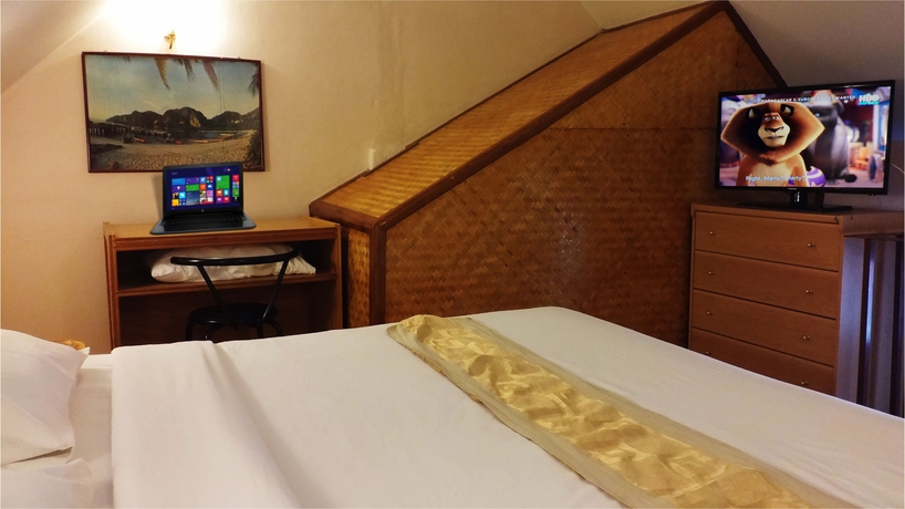 Imagen de la habitación del Hotel Karon Café Inn. Foto 5