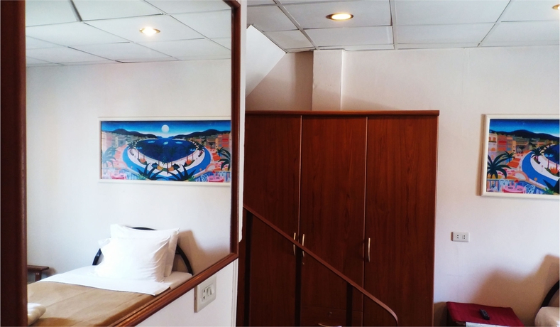 Imagen de la habitación del Hotel Karon Café Inn. Foto 7